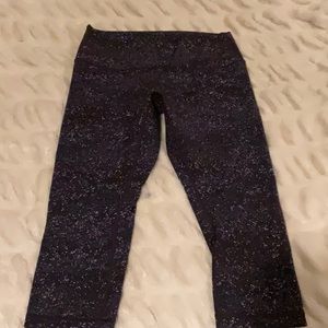 Like new, Lululemon crop leggings, purple decorated spots size 10, no tears